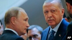 Vladimir Putin (solda) və Recep Tayyip Erdoğan (Foto arxivdəndir)