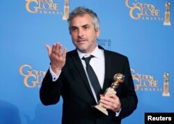 "Gravity" filmi də artıq "Golden globe" qazanıb. Filmin rejissoru Alfonso Cuaron, Kaliforniya, 12 yanvar 2014